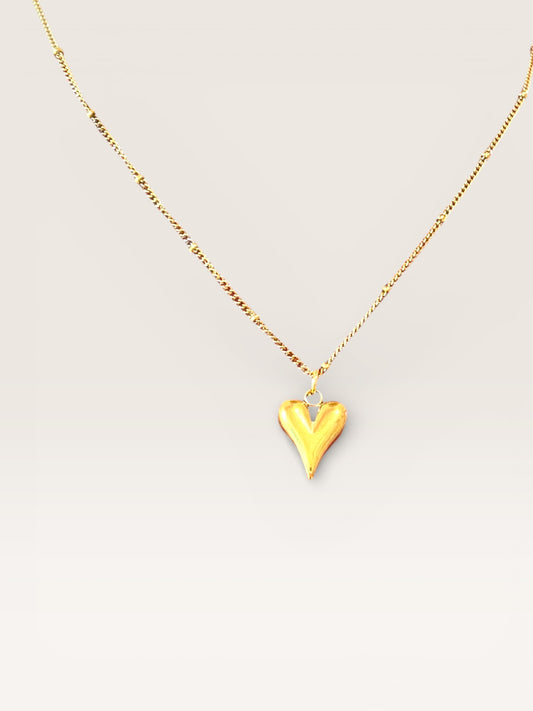 Collier cœur doré en acier inoxydable sur fond clair – Collection Pour Toi By Maryon