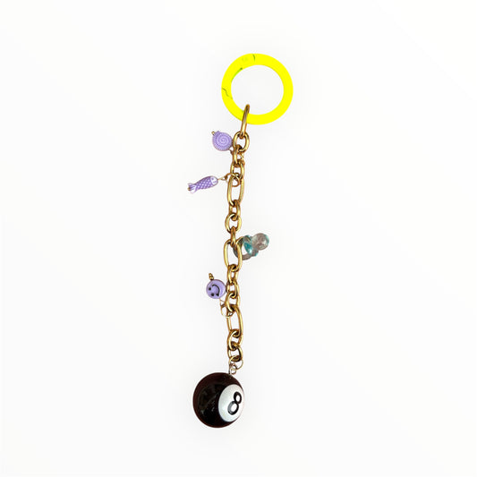 Grigri de sac avec charms colorés et chaîne dorée By Maryon